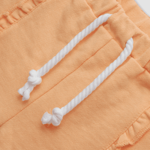 Short de niña color vuelitos naranjo (3 meses a 3 años)