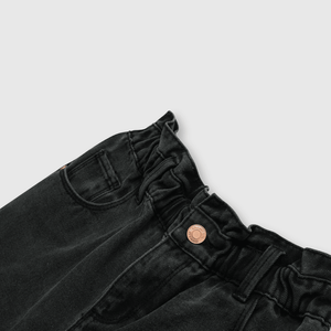 Jeans de niña recogido negro (2 a 12 años)