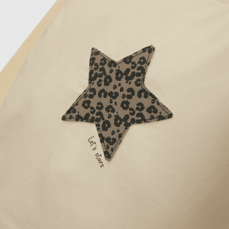 Polera Blanca Aplicación Estrella de Animal Print