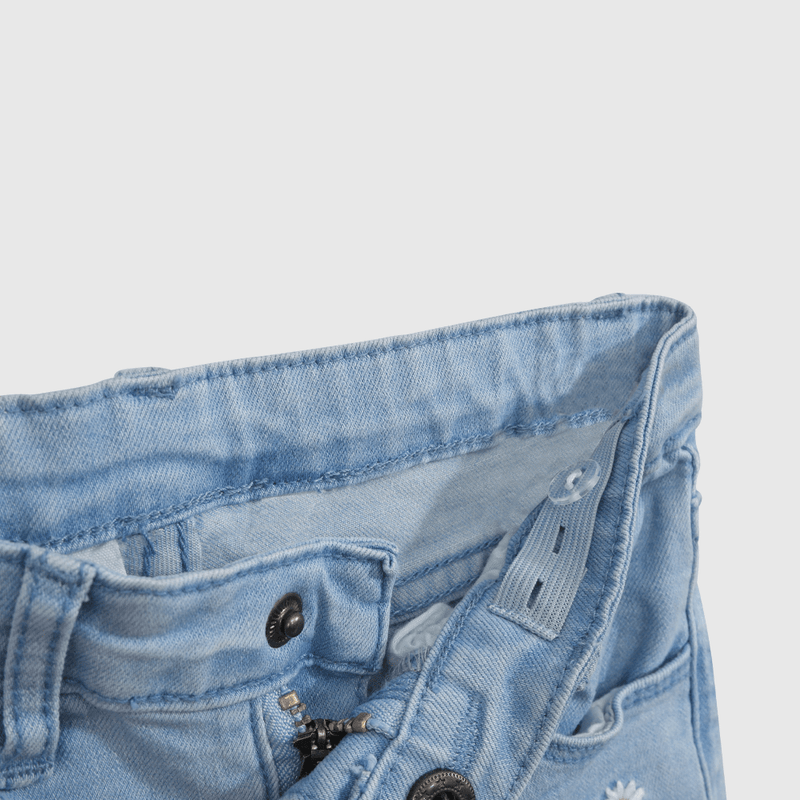 Jeans Elasticado Denim Celeste con Flores para bebé de 3/6 a 36 meses