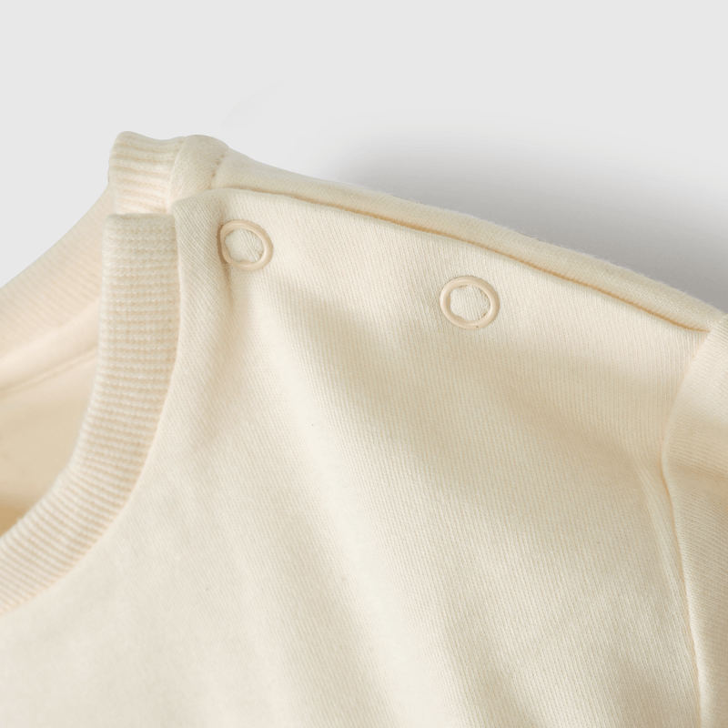 Conjunto suave beige con león para guaguas