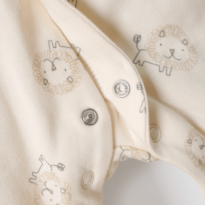 Enterito suave beige con leones para guaguas