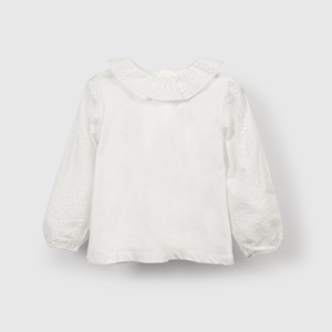 Polera blanca con detalles encantadores para niñas