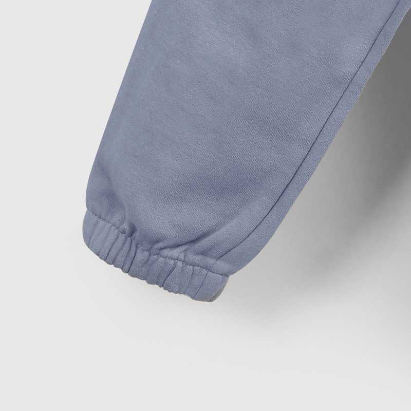 Buzo celeste suave para niños, ideal para jugar