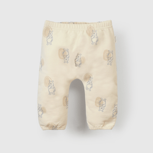 Buzo beige con Winnie the Pooh para guaguas