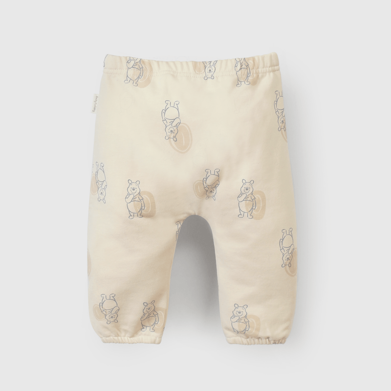 Buzo beige con Winnie the Pooh para guaguas