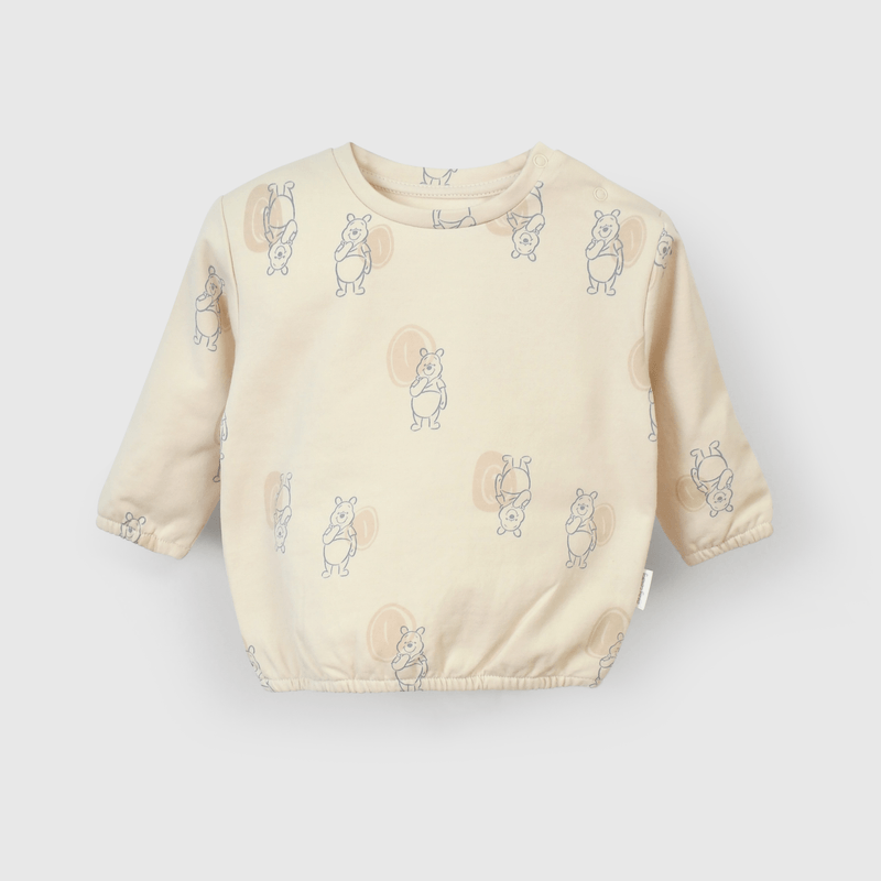 Polerón beige con Winnie the Pooh para guaguas