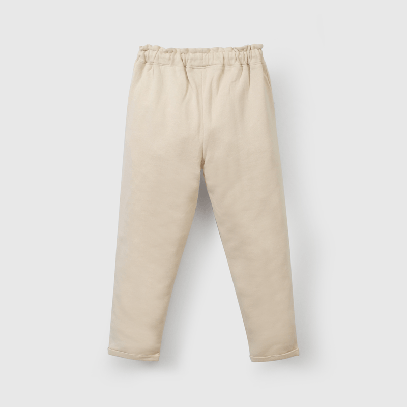 Buzo suave y cómodo para niños en color beige