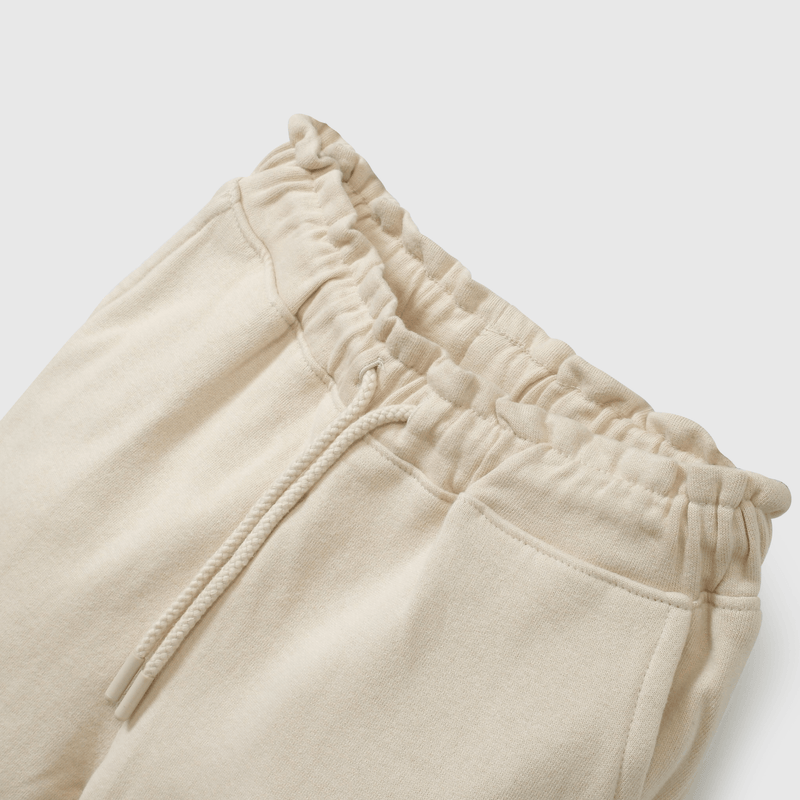 Buzo suave y cómodo para niños en color beige