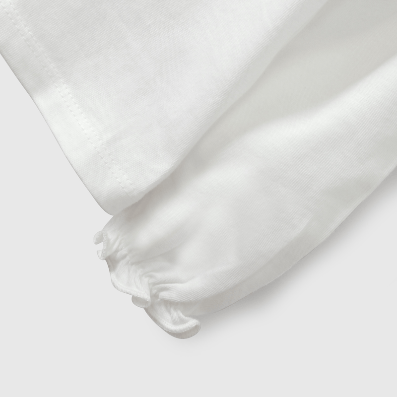 Polera blanca con flores para niñas, estilo encantador y cómodo
