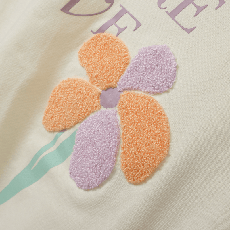 Polera amarilla con flor para niña, estilo único y cómodo