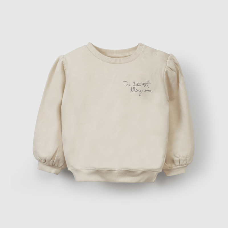 Polerón beige suave para niñas, comodidad y estilo