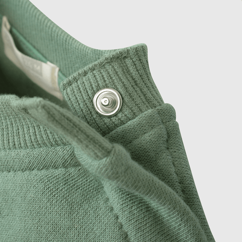 Polerón verde dinosaurio para niños, estilo y comodidad