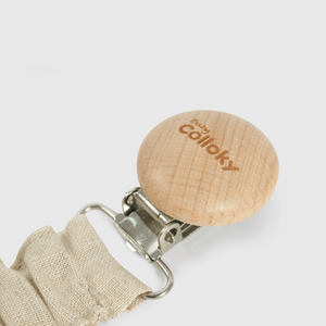 Portachupete beige para guaguas, accesorio tierno y práctico