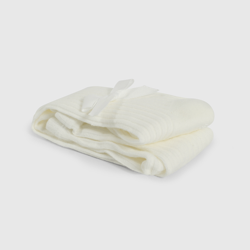 Panty blanco con moño para niñas, comodidad y estilo