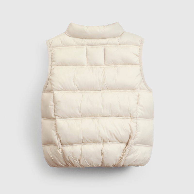 Chaleco acolchado beige para niños, estilo y calidez