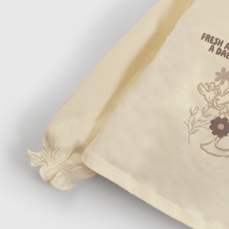 Polera amarilla con Daisy para niñas en crecimiento