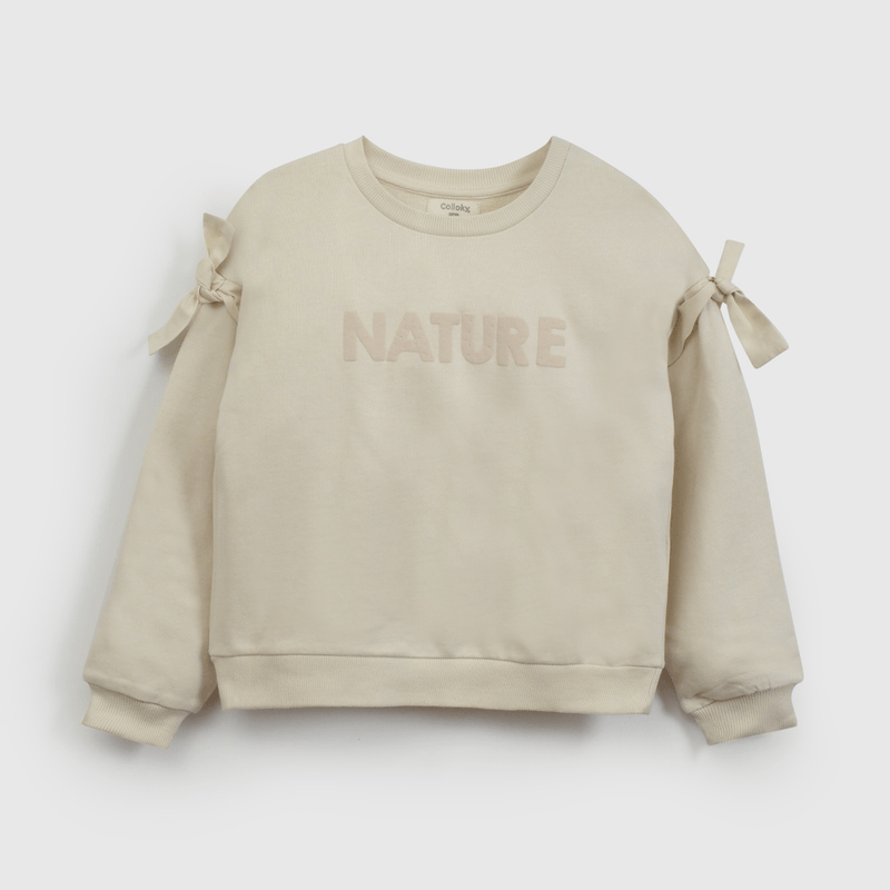 Polerón Beige Nudos  de Niña talla 3 a 12 añoss