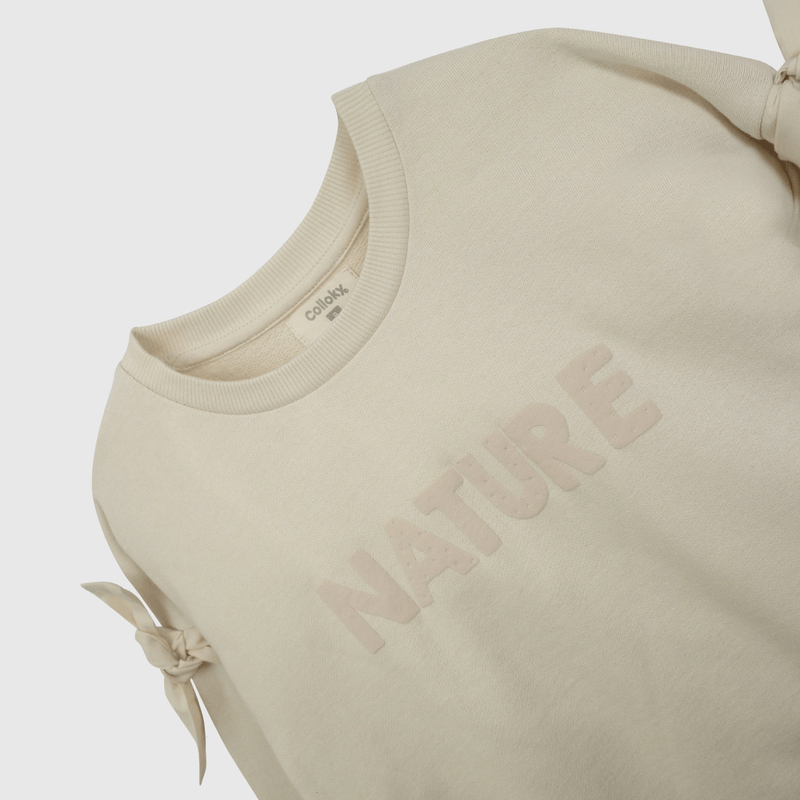 Polerón Beige Nudos  de Niña talla 3 a 12 añoss