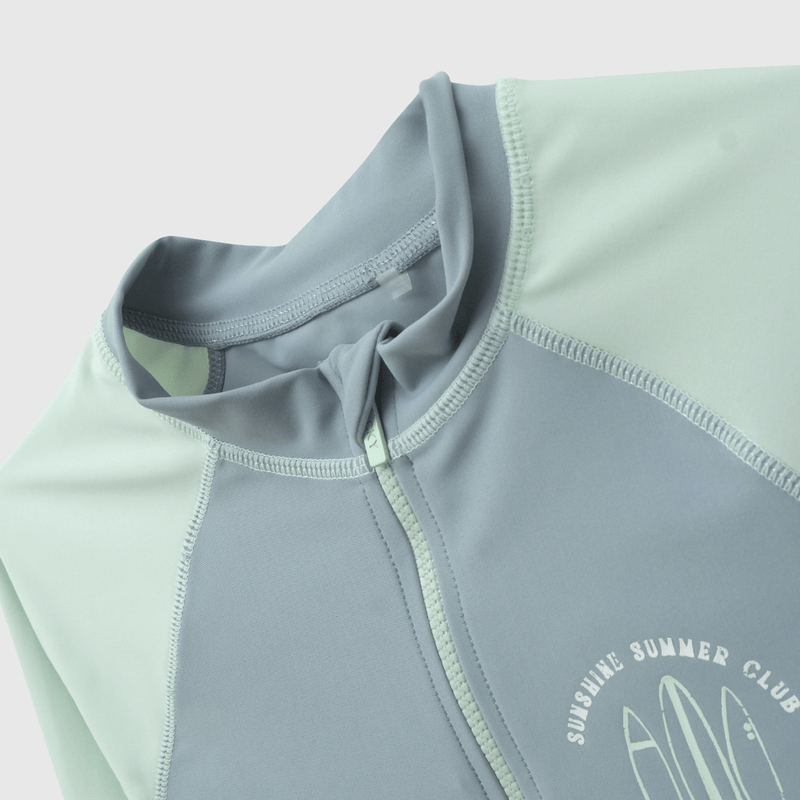 Polera Playa UV Celeste de Niño talla 3 a 12 añoss